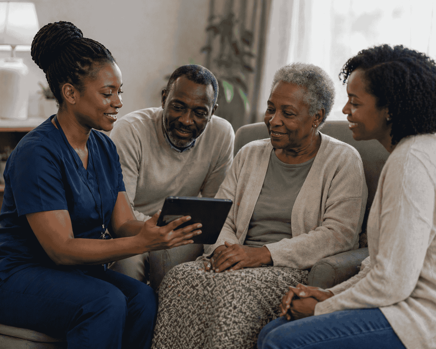 Nurse checking patient's blood pressure at home
